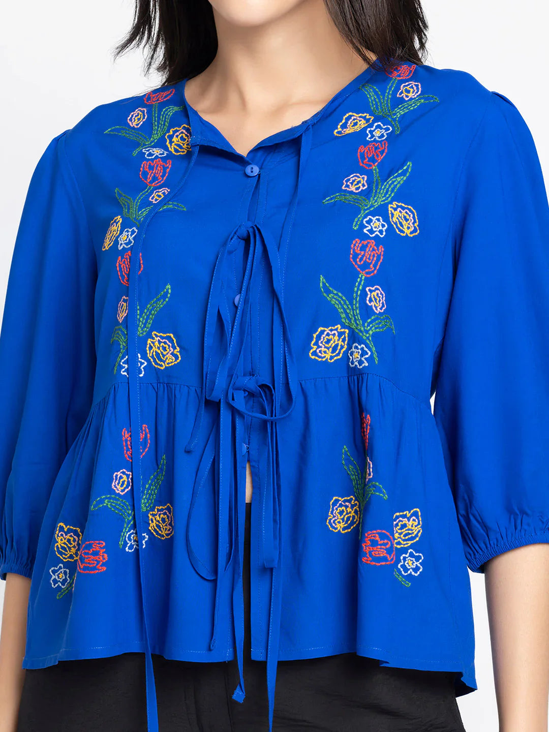 Cobalt blue embroidered round neck button down tie up peplum top