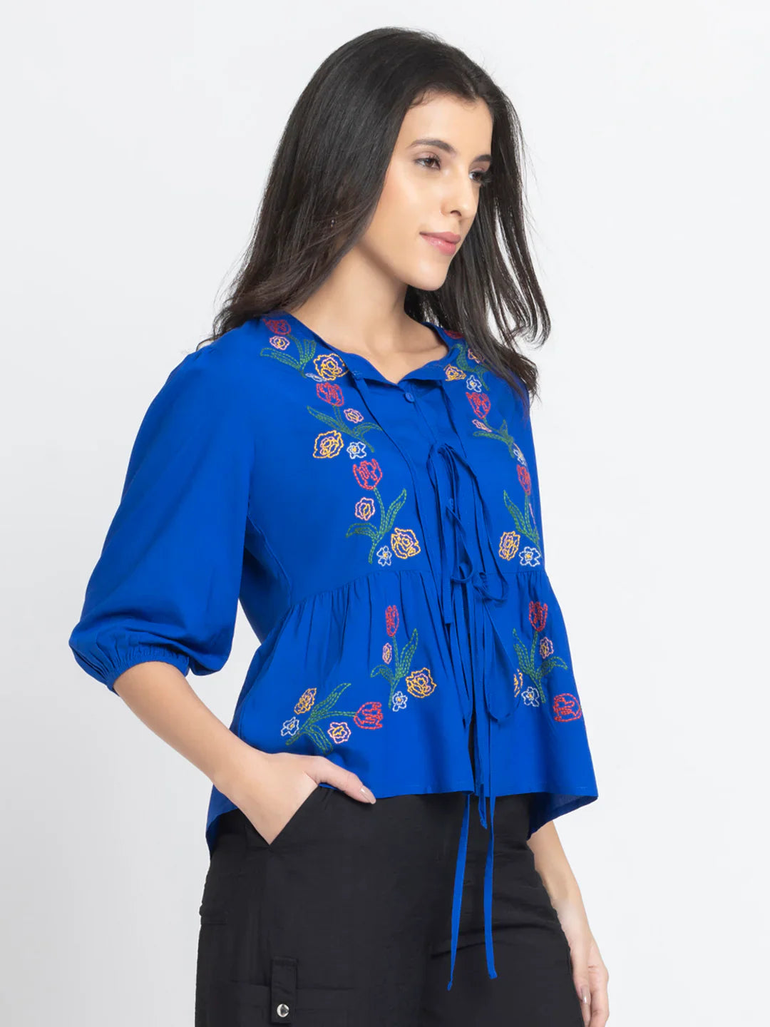 Cobalt blue embroidered round neck button down tie up peplum top