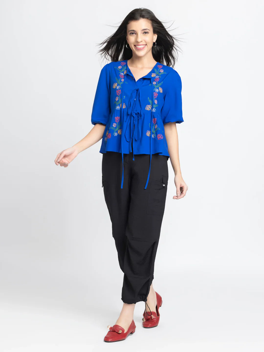 Cobalt blue embroidered round neck button down tie up peplum top